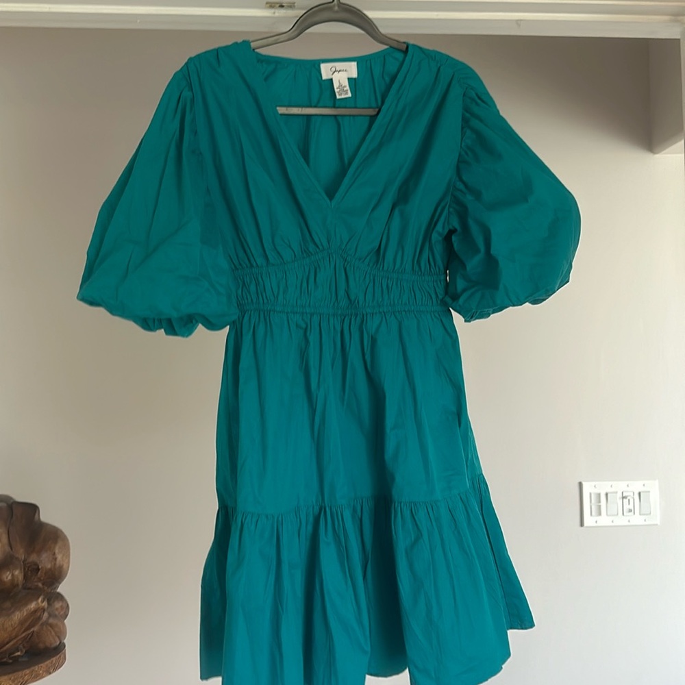 New dress without tag. Beautiful aqua color/ turquoise